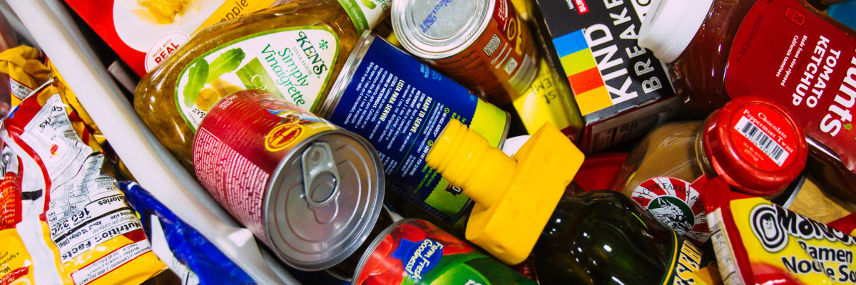 various non-perishable foods in a bin